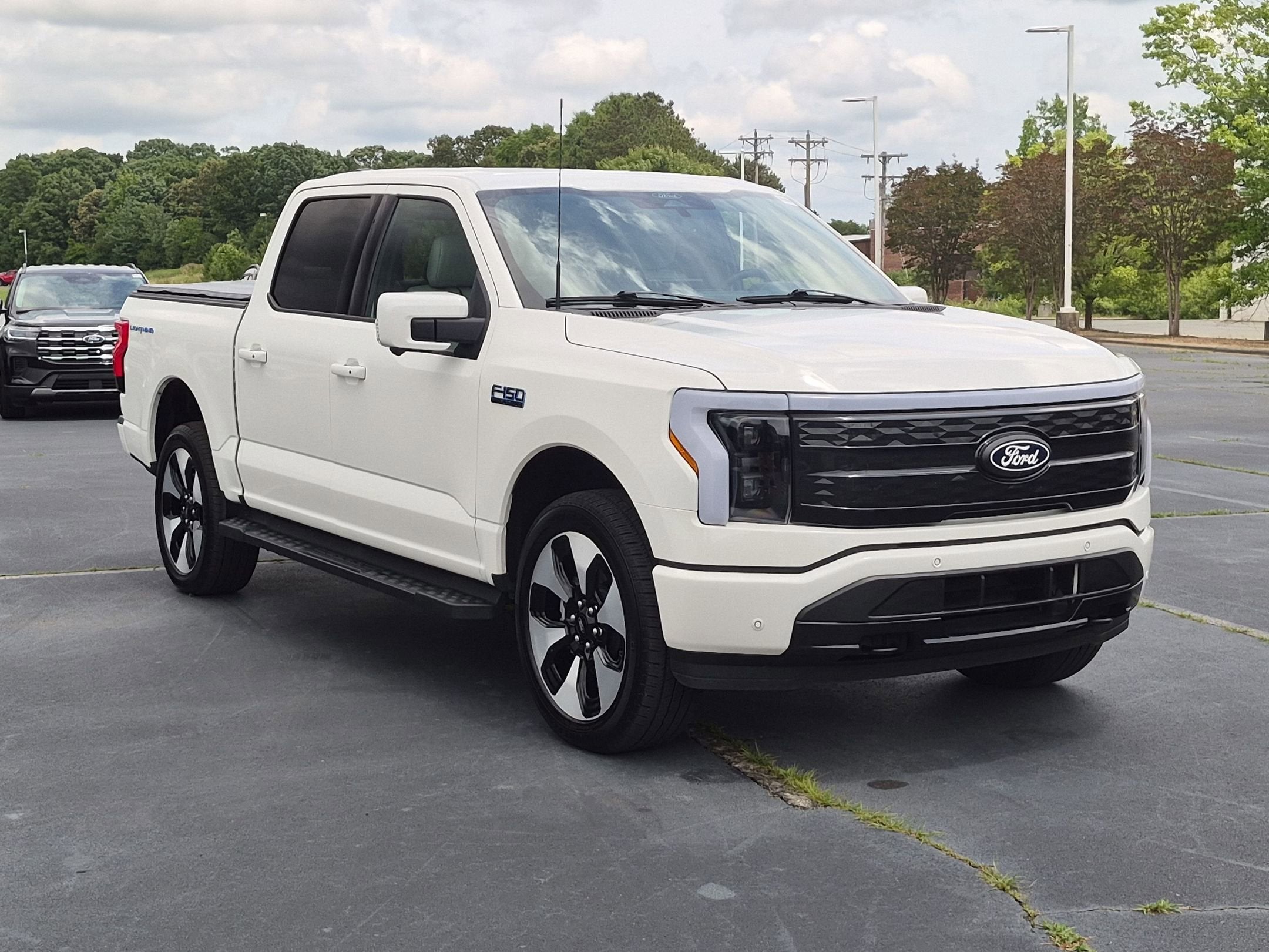 Used 2025 Ford F-150 Lightning Platinum with VIN 1FT6W7L7XSWG02608 for sale in Indian Trail, NC